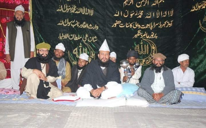 Devotees listening to a sermon